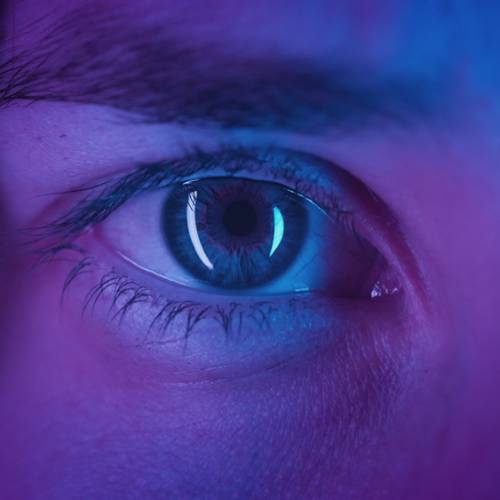 Extreme,Close-up,Beautiful,Girl,Opens,One,Eye,,Neon,Pink,Blue